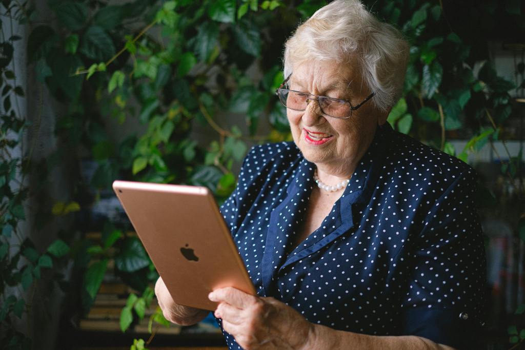 Older adult woman on an iPad